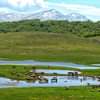 L'immagine può contenere: montagna, cielo, nuvola, erba, spazio all'aperto, natura e acqua
